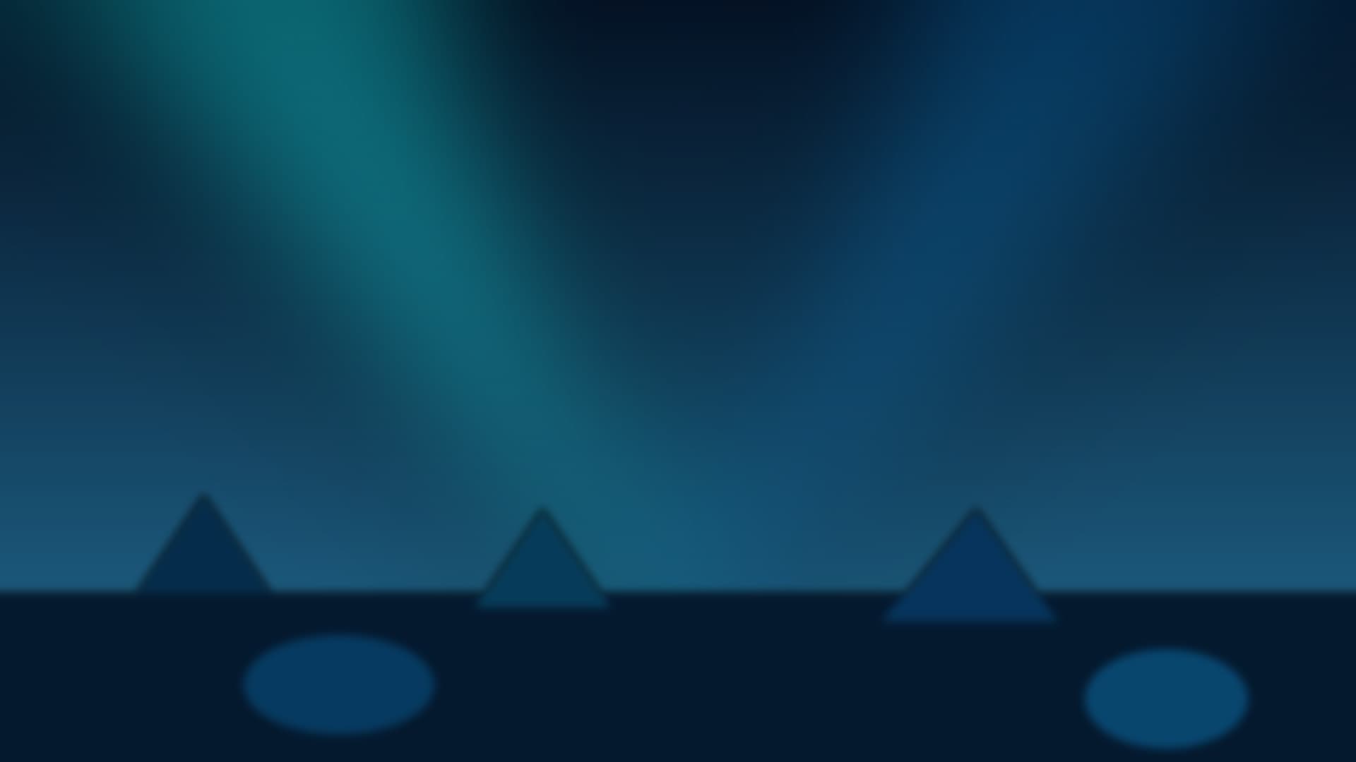 Diver shining a light across a coral reef canyon